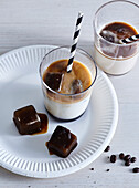 Coffee ice cubes with chocolate and milk