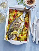 Baked sea bream with potatoes