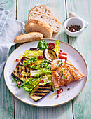 Salad with grilled vegetables and salmon
