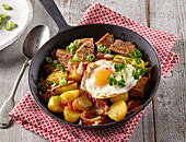 Potato pan with fried egg