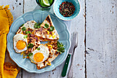 Quesadilla with beans, ham and fried eggs