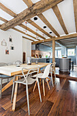 Modern table and classic chairs in dining area