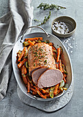 Pork roast with vegetables in papillote