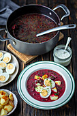 Young beetroots soup with potatoes and egg