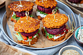 Sweet potato fritters with beetroot burger