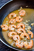 Sweet and sour shrimp in a pan