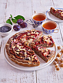 Poppy seed cake with plums