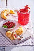 Red currant jelly with rum and croissants