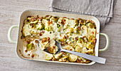 Baked Winter coucous casserole with Brussels sprouts and nuts