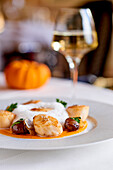 Fried scallops with pumpkin cream and chestnut foam