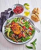 Summer salad with eggplant and grilled cheese