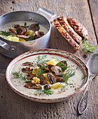 Sour potato soup with mushrooms