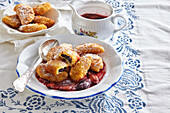 Sweet crocquettes with plum butter filling and plum sauce