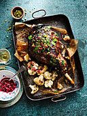 Leg of lamb marinated in pomegranate syrup with cauliflower