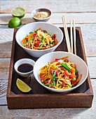 Asian salad with zucchini, carrots and sesame