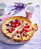 Creamy pie with lavender and raspberries