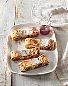 Custard strudel with cranberry sauce