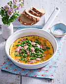 Ham and cheese omelette with green peas