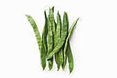 Romano flat green beans on white background top view