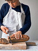 Rye bread being sliced