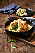 Pesto-stuffed cauliflower cheese