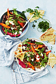 Spiced beef and sweet potato salad with beetroot hummus
