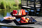 Fresh fruit and vegetables on garden table