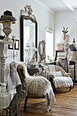 Living room lavishly decorated with shabby-chic collectibles