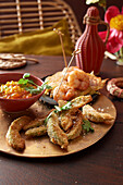 Avocado fries and prawns on potato pancakes (Spain)