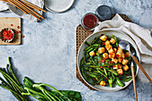 Sichuan-style Asian greens stir-fry with crispy tofu