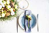 Place setting for festive Christmas dinner with beautiful dinnerware