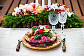 Place setting for festive Christmas dinner with beautiful dinnerware