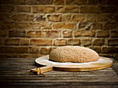 Bread dough on a wooden board
