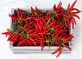 Red chilies in a wooden box