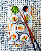 Maki sushi with sesame seeds, wasabi and tamari