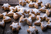 Star-shaped sweet yeast pastries dusted with icing sugar