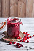 Homemade cranberry sauce in a preserving jar