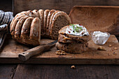 Mixed wheat-spelt bread with walnuts and vegan cream cheese substitute