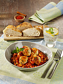 Chicken and apricot kefta on chickpea and tomato ragout