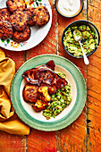 Sweet potato and corn cakes with tamarind bacon and avocado
