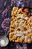 Crumble cake with polenta and summer plums
