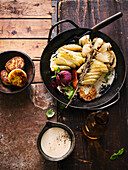 Oven-baked kohlrabi and onions with bock beer mustard sauce