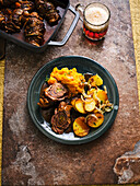 Beef roulades in Altbier sauce with pumpkin mash and fried potatoes