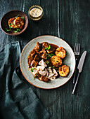 Malty venison ragout with creamed mushrooms and napkin dumplings