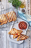 South African Braaibroodjies - grilled sausage sandwiches