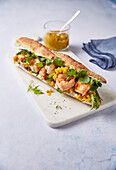 A prawn baguette with cream cheese and mango chutney to take away