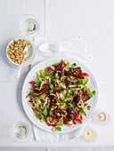 Miso-glazed tofu steaks with beansprout salad and egg strands