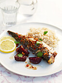Plate of mackerel with beetroot and rice
