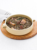 Lentil stew with sausage and bacon