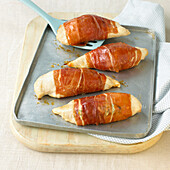 Chicken stuffed with ricotta and wrapped in pancetta